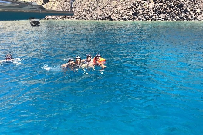 ALL-INCLUSIVE: Santorini Caldera Cruise with Greek Meal & Drinks - From Vlychada marina to your first swim breaks: Red Beach and Mesa Pigadia