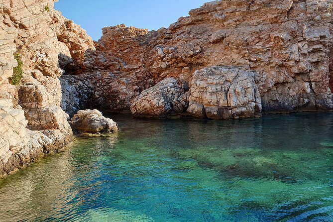 Antiparos & Despotiko: Swim, Explore, and Savor Lunch from Paros - First Swim Stop at the Antiparos Sea Caves: Vivid Blue Water and a Safety Reality Check