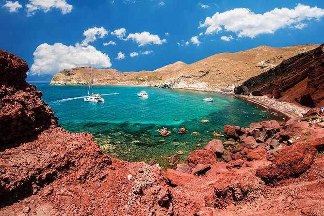 Archaeological Bus Tour To Akrotiri Excavations & Red Beach - Pickup times, bus comfort, and the one place to wait