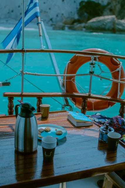 Argostoli: Full-Day Boat Trip with Lunch & Wine - Water gear, dinghy transfers, and safety for non-experts