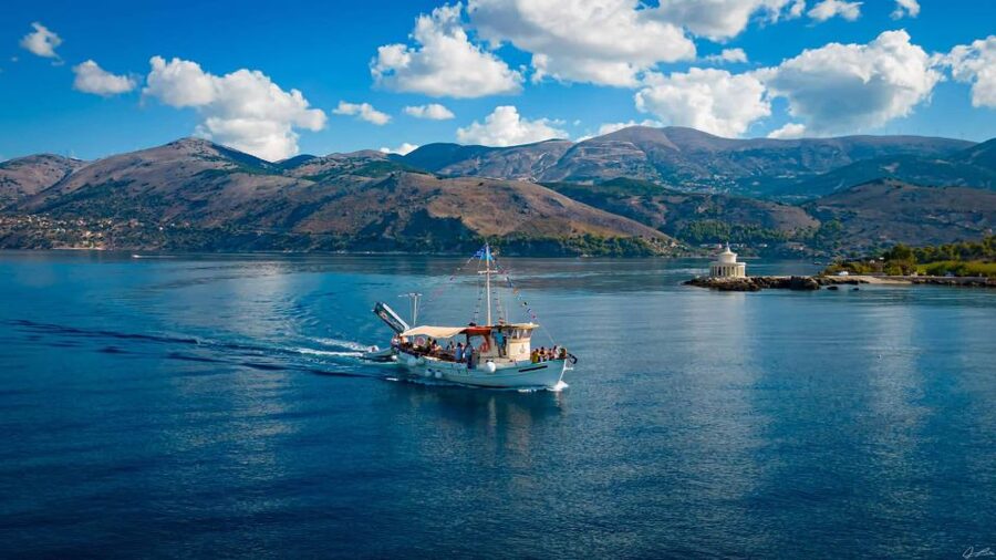 Argostoli: Full-Day Traditional Boat Cruise with Lunch - White Rocks Beach, your cleanest start in Kefalonia water