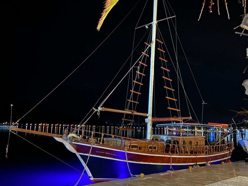 Argostoli: Sunset Cruise with Swim Stops, Dinner, and Wine - Dinner on deck: moussaka, salad, and wine that keeps showing up