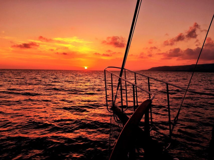 Argostoli: Sunset Cruise with Swim Stops, Dinner, and Wine - Finding Queen Bee Boat Trips in Argostoli, then settling in