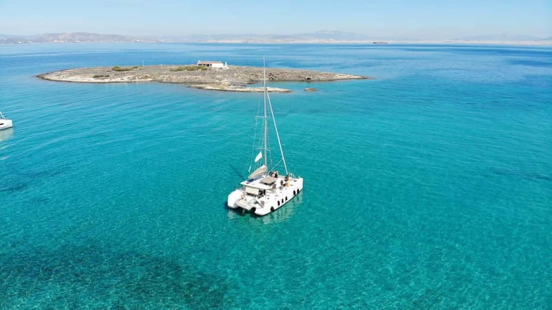 Athens: Half-Day Morning Catamaran Cruise with Meal & Drinks - From Port to Hydrousa Island: Your First Swim Stop on the Saronic Gulf