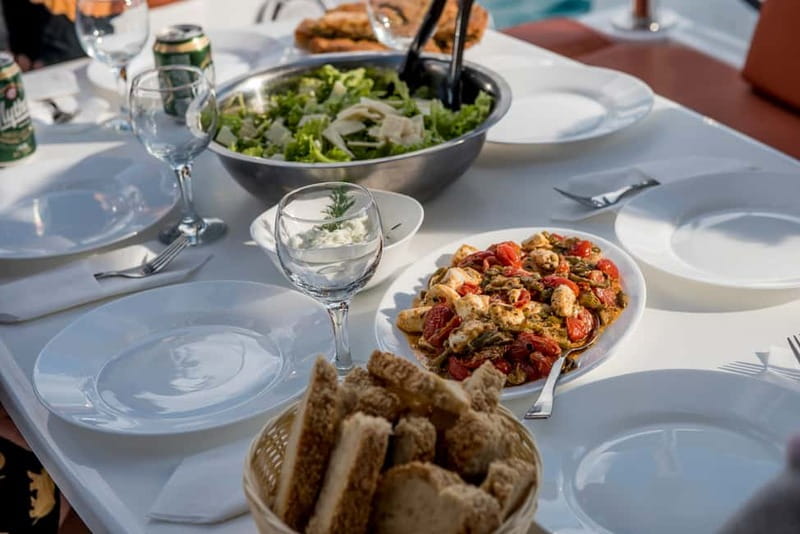 Athens: Half-Day Morning Catamaran Cruise with Meal & Drinks - Vouliagmeni Bay: Greek Tapas and the Second Anchor-and-Swim Moment