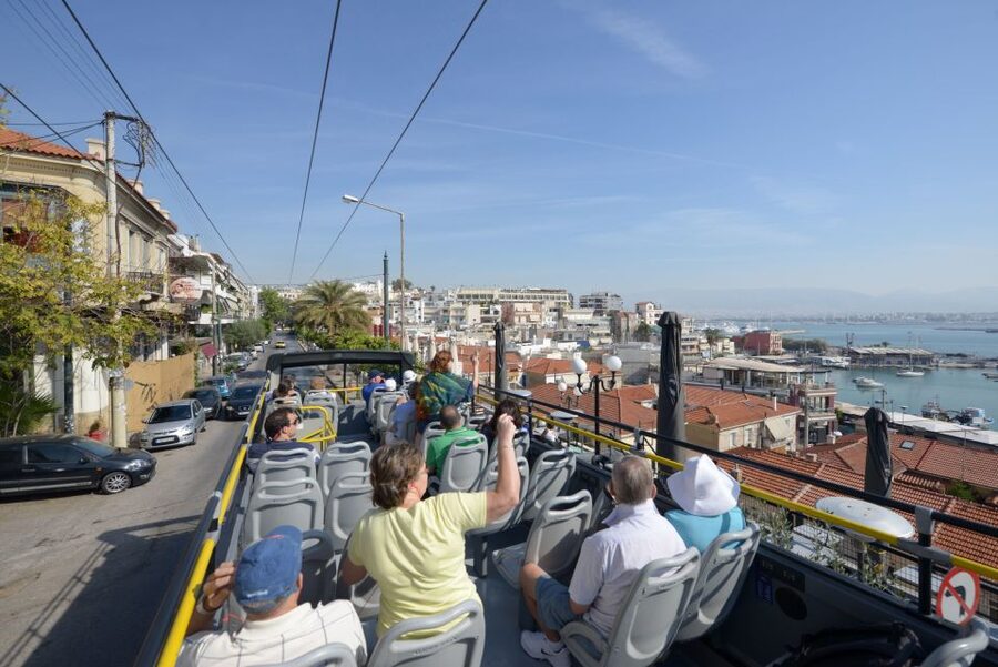 Athens, Piraeus, and Coastline: Blue Hop-On Hop-Off Bus - On-board experience: audio in 16 languages, earphones, and Wi-Fi limits