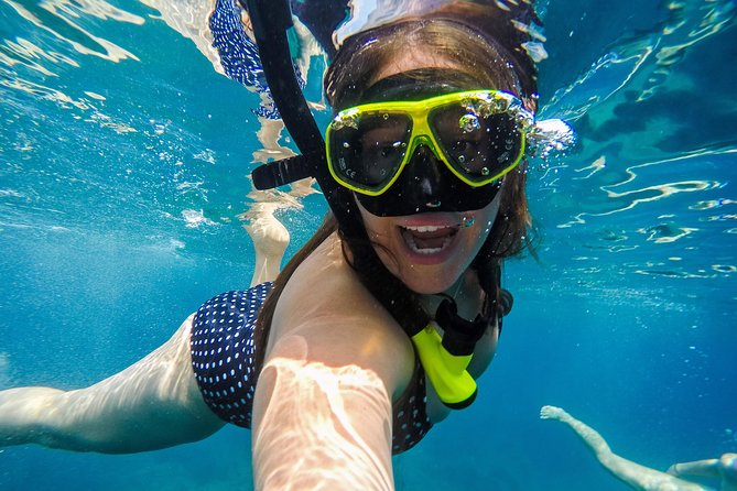 Athens Private Luxury Catamaran Cruise with Traditional Greek Meal and BBQ - Snorkeling Gear, Deep Blue Water, and the BBQ Smell Trick
