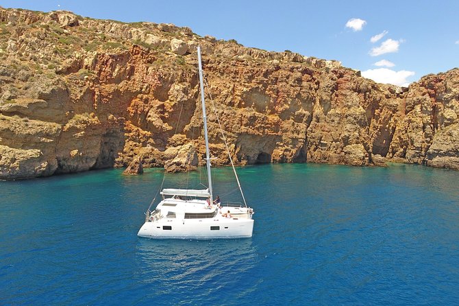 Athens Private Luxury Catamaran Cruise with Traditional Greek Meal and BBQ - Getting Onboard: Welcome Drink, Safety Briefing, and Quick Orientation