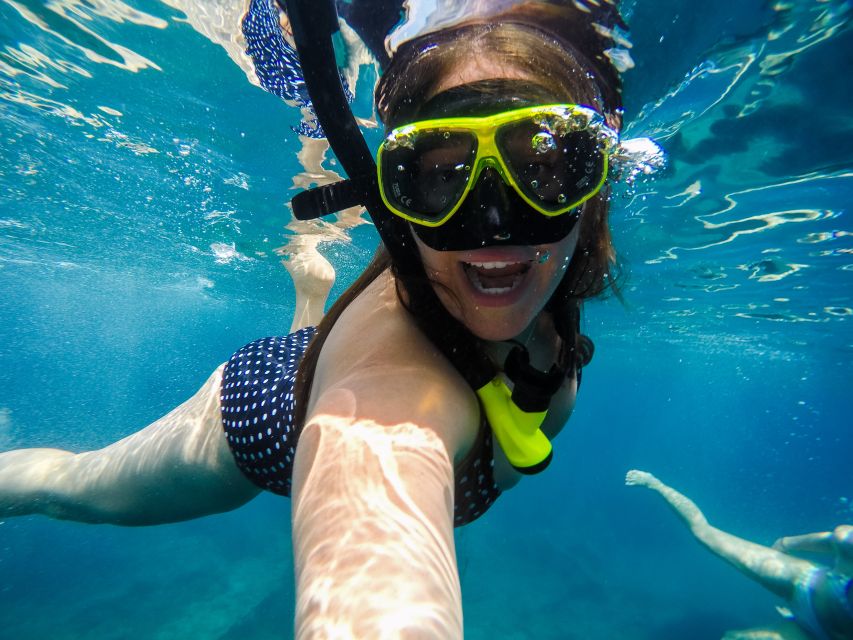 Athens: Riviera Catamaran Cruise with Meal and Drinks - Swim stop at Voula: where your day turns from scenic to fun