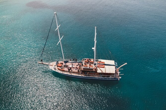 Athens Riviera Sunset Cruise with Snacks and Drinks Included - Swim stops near Vouliagmeni: the moment this cruise earns its value