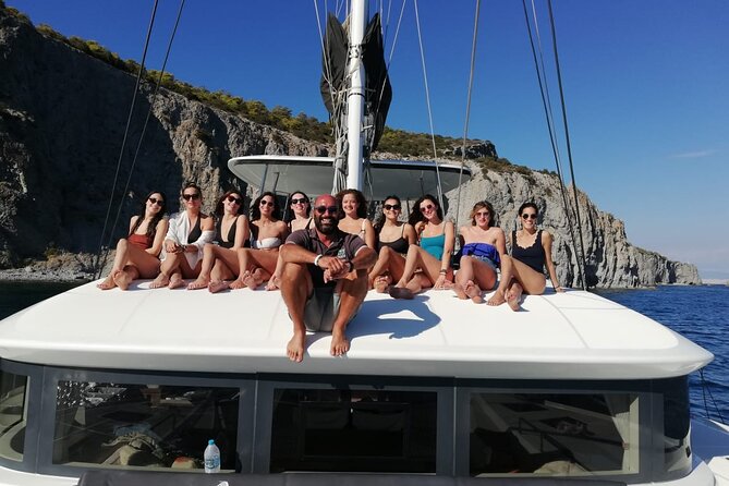 Athens Semi private Morning Catamaran cruise with meal & drinks - Stop 2, Vouliagmeni Beach near Astir: a second splash in a prestigious spot