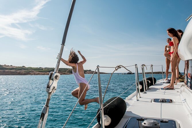 Athens Semi private Morning Catamaran cruise with meal & drinks - Stop 1, Megalo Kavouri: crystal-clear shallow water for your first swim