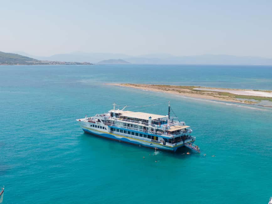Athens: Swimming Cruise with Lunch, Wine & Live DJ on Board - On-board comfort: loungers, beanbags, showers, and DJ energy