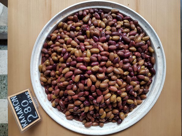 Athens: The Classic Food Tasting Tour - Iconic Cretan Tastes: Cheese, Olives, Rusks, Olive Oil, and Raki