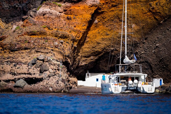 Beautiful Day Catamaran Caldera Cruise incl. Meal & Drinks - Crew service and practical comfort: motion, snorkeling, and small-group attention