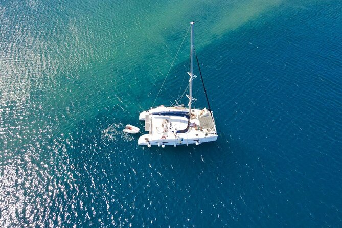 Best of Santorini Private Half-Day Catamaran Cruise with transfer and meal - Palea Kameni and Nea Kameni hot springs: sulfur water and the fun part of the volcano