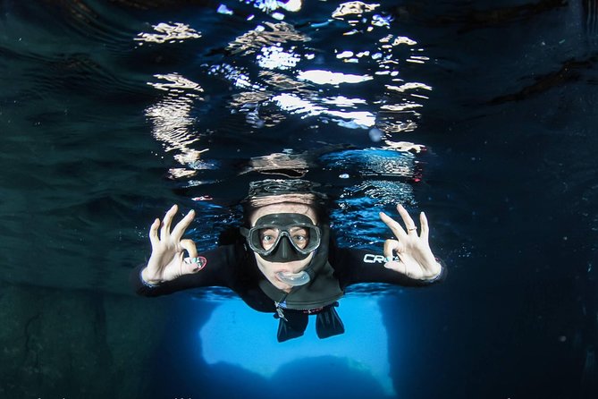 Boat Trip in Crete with Guided Snorkeling and Free Pick up! - Stop 1: Akrotiri Bays, Swimming Time, and the Blue Cave Glow