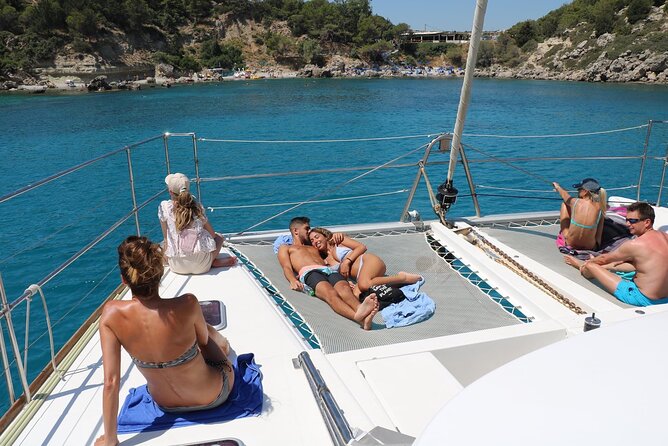 Catamaran Cruises Rhodes - 6 Hours Day Cruise ALL INCLUSIVE - The Boat Experience: Shade, Restroom, Music, and Crew Energy