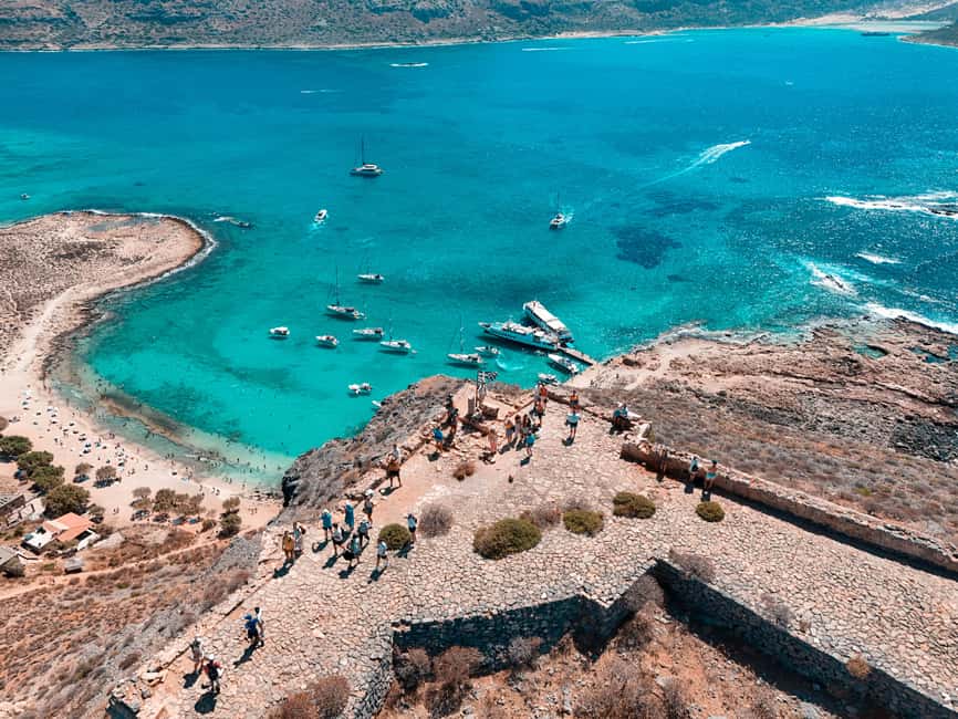 Chania: Balos Gramvousa Cruise with Transfer and Boat Ticket - Balos Lagoon Time: Pink Sand, Turquoise Water, and the Real Meaning of Swim Shoes