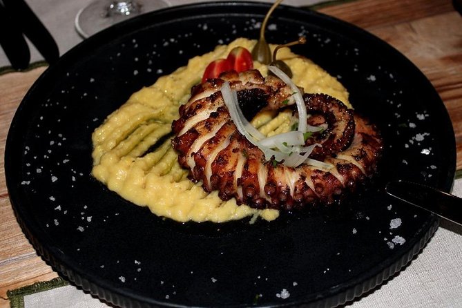Cook with Locals | Cretan cooking Class at Archanes Village - Where the atmosphere lands: sea sounds, covered patio, and wine-and-raki moments