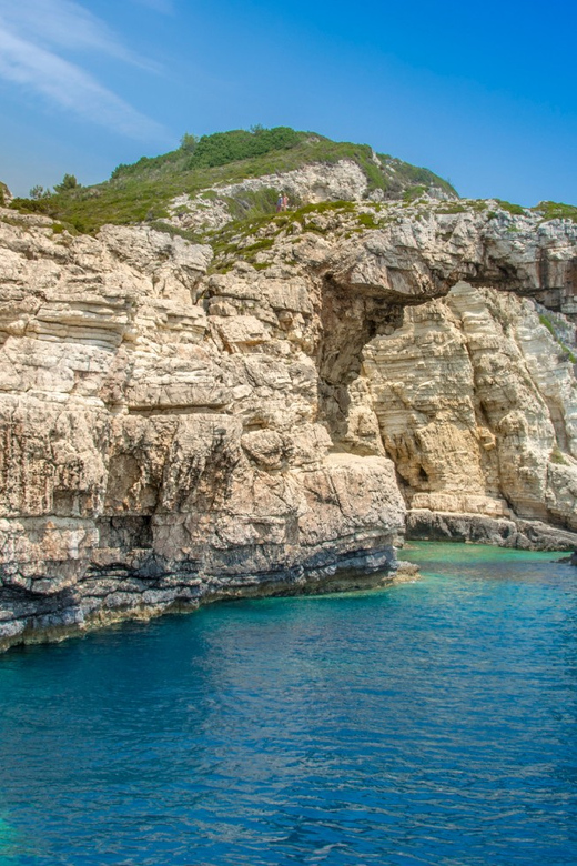 Corfu: Paxos Island Full-Day Cruise with Blue Caves - Getting onboard: host, boat vibe, and the safety you should look for