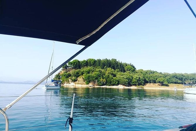 Corfu Private Yacht Cruise - Onboard comfort: compact boat, good basics, and real bathroom access