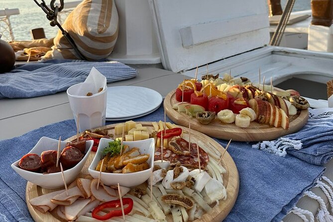 Corfu: Sunset Cruise on a Wooden Vessel with Cocktails & Bites - Cocktails, local wine or beer, and snacks that actually matter on a boat