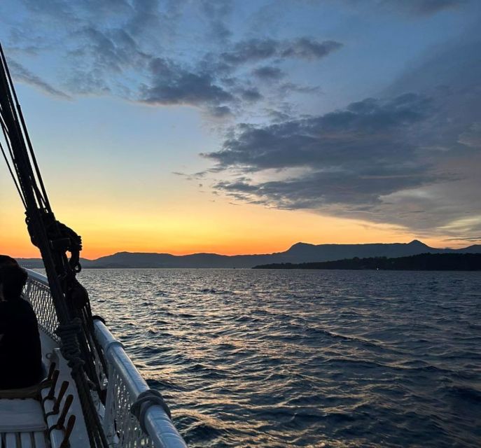 Corfu: Sunset Cruise on Classic Boat with Cocktails & Snacks - Garitsa Bay, Mon Repos, and the Old Fortress from a Different Angle