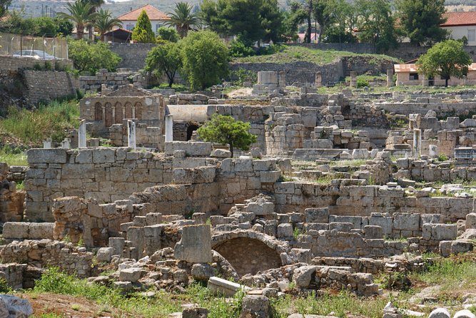 Corinth Half-Day Trip from Athens with Entrance Tickets - Archaia Korinthos Ruins: Temples, Baths, Forum, and the Bema