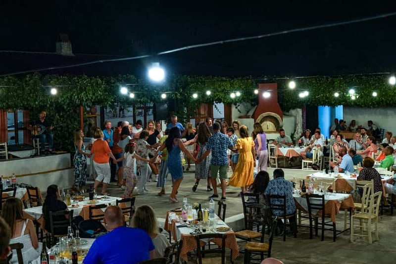 Cretan Night: Dinner & Live Show at Pano Karouzanos Village - Heraklion pickup and the mountain drive that sets the mood