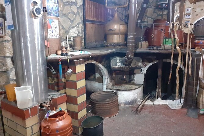 Cretan Wines & Olive oil tour - The treasures of Crete - Stironas Raki Distillery: Methods, Cellar Tastings, and a Traditional Lunch