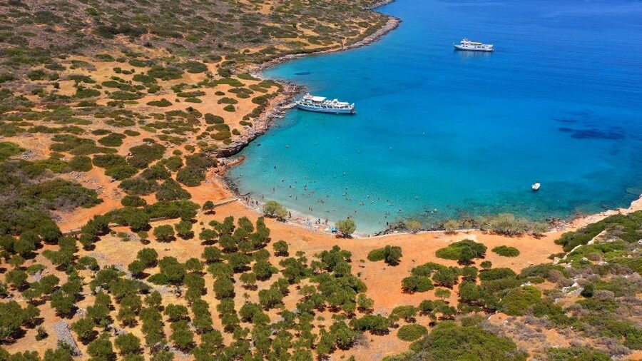 Crete: Mirabello Bay Cruise with Onboard Cocktail - Group Vibe and Experience Style: Good for Couples, Friends, and Swim Fans