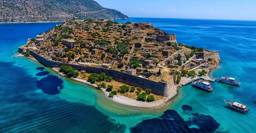 Crete: Spinalonga, Elounda, & Agios Nikolaos Boat Tour & BBQ - Kolokytha beach time: swimming, snorkeling, and the BBQ on board