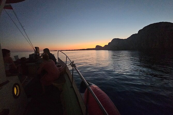 Dreamy Cruise sunset tour with dinner and unlimited wine! - Stop 2: Xi Beach for a later swim at an isolated spot