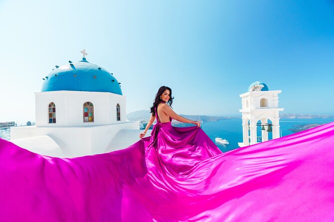 Exclusive Santorini Flying Dress Photoshoot with Pickup - Stop 1: Blue Dome Imerovigli photo session with caldera and volcano views