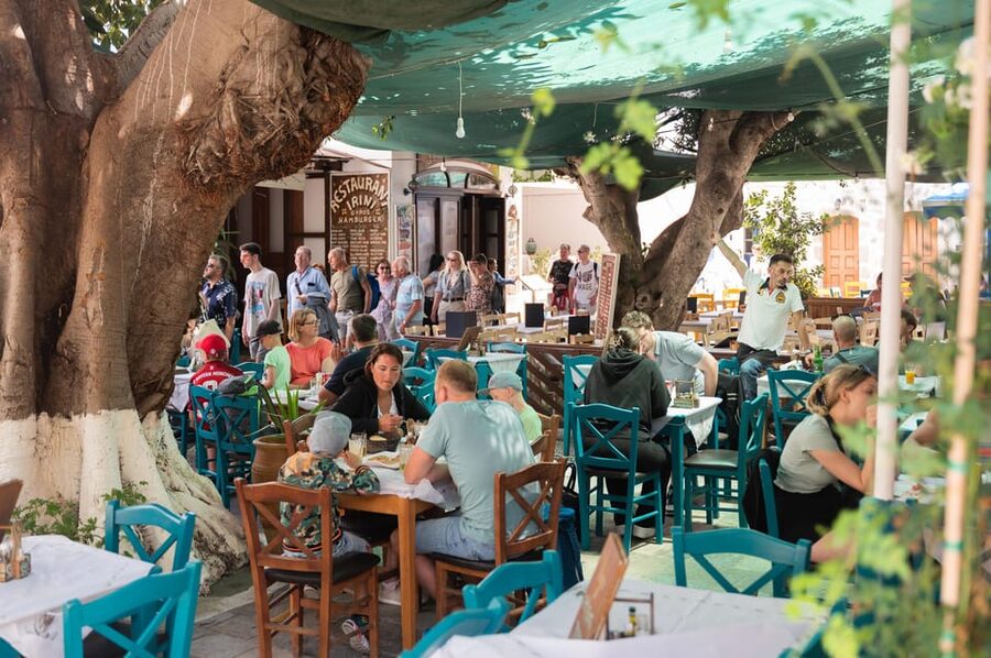 Explore Nisyros Island with Hotel Pick Up and Guided Tour - Mandraki time: kapama, soumada liqueur, and easy wandering