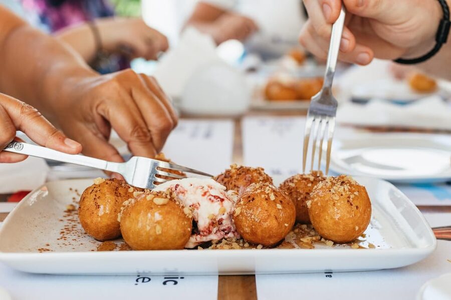 Fira: Guided Foodie Walking Tour with Tastings - Traditional Mezes in a Tavern: Your First Real Taste of Santorini
