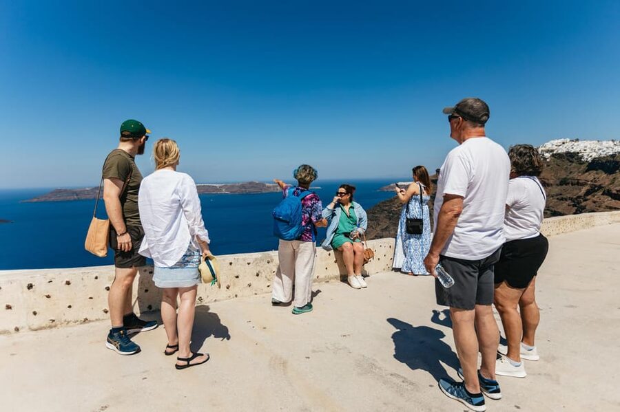 Fira: Guided Foodie Walking Tour with Tastings - Daily Market Detour: Fresh Fish and Vegetables in Real Time