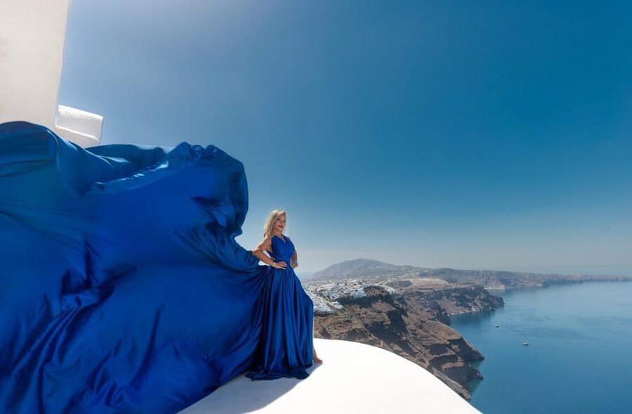 Flying dress Photoshoot in Santorini with Hotel Pickup - Imerovigli: the blue-domes-and-white-walls backdrop that works every time