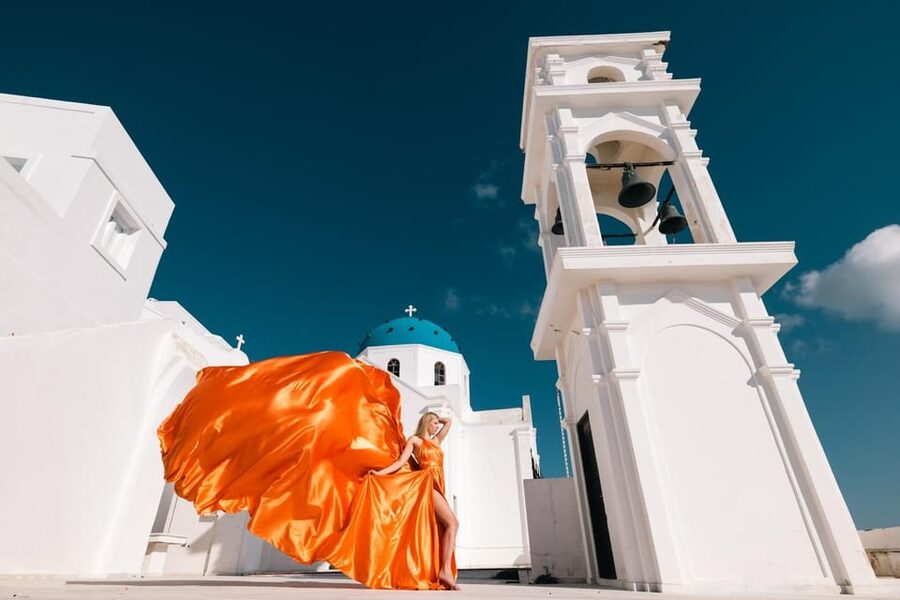 Flying dress Photoshoot in Santorini with Hotel Pickup - Photo delivery: raw files same day, then edited images over two days