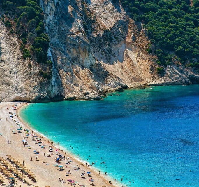 From Argostoli: Melissani Lake and Myrtos Beach Tour - Myrtos Beach Time: White Pebbles, Deep Blue Water, and Umbrellas