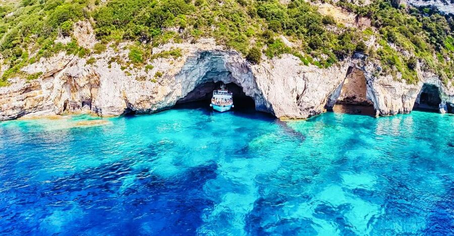 From Corfu: Day Cruise to Paxos, Antipaxos, and Blue Caves - Antipaxos swimming off Mesovrika or Voutoumi Beach