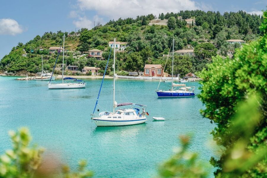 From Corfu Island: Antipaxos & Paxos Blue Caves Boat Cruise - Paxos Blue Caves and Erimitis cliffs: where the photos become real