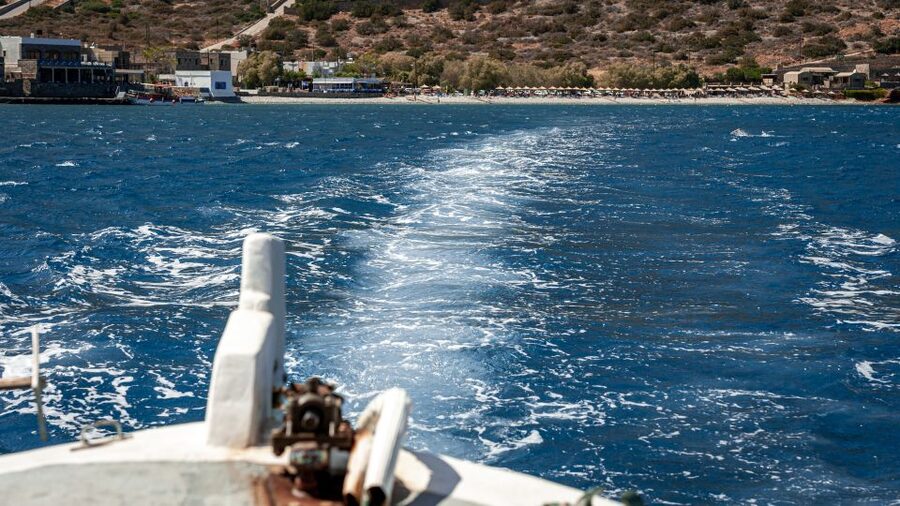 From Heraklion: Elounda, Kolokitha, and Spinalonga Boat Trip - Kolokytha Beach, sandy shoreline and lagoon scenery for real downtime