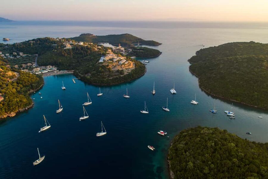From Lefkimmi: Syvota, Blue Lagoon and Cave Sunset Cruise - Sivota Cave by boat: quick photos, real wow factor