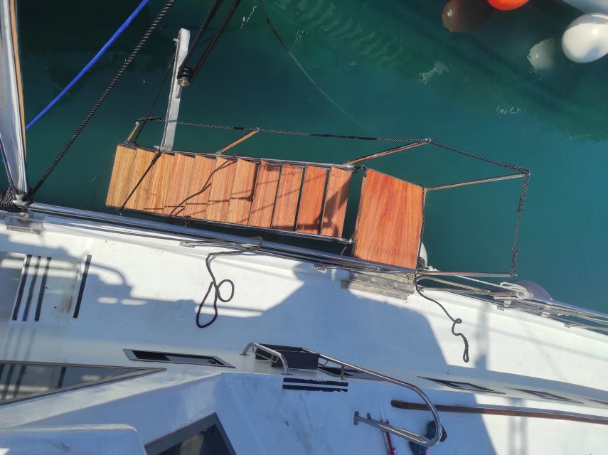 From Parga: Paxos and Antipaxos Cruise with Blue Caves - Ortholithos rock photo time, then sailing into Gaios