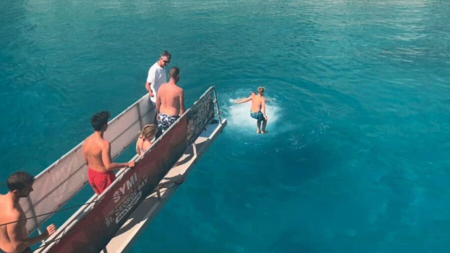 From Rhodes: Cruise to Symi Island and Saint George's Bay - On-board experience: seating, showers, and crew that stays busy