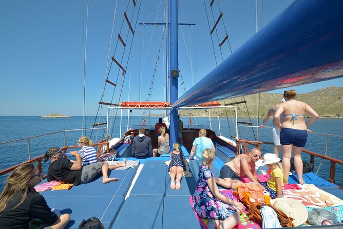 Full Day 3-Island Boat Cruise from Port of Kos - Plati Swim Stop and the St. Nikolaos Area: Fish Farms, Dolphins, and Clear Water