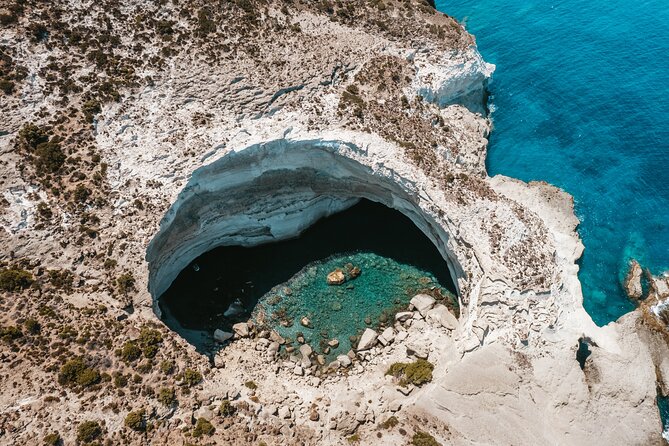 Full day sailing cruise on the West side of Milos island - Stop 2 Agios Ioannis: Little Coves and Whitewashed Monastery Views