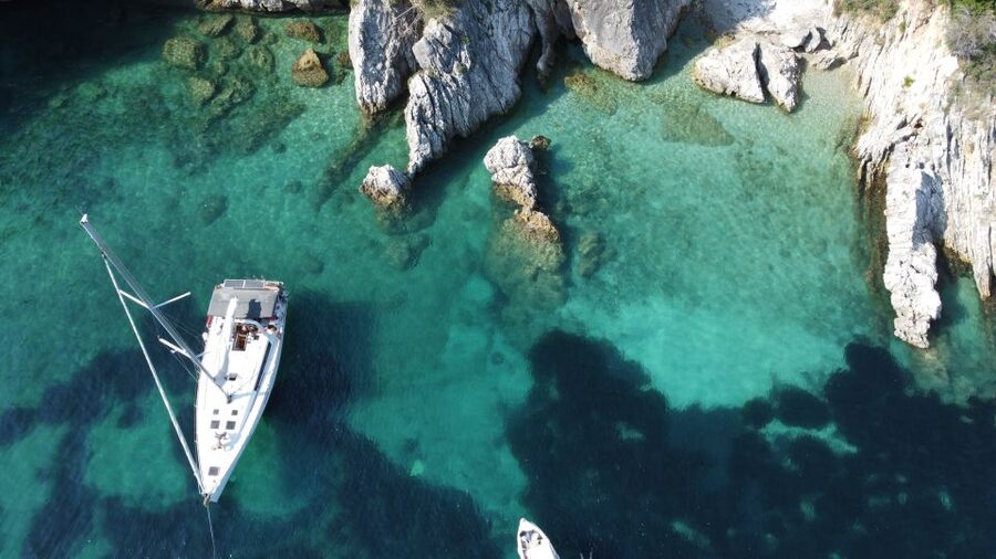 Gouvia: Corfu Island Sailing Trip with Snack and Soft Drinks - Barbati Beach: your first swim and snorkel-friendly stop